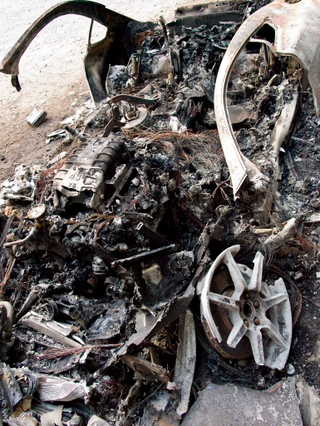 Illustration for article titled This Melted Aston Martin Looks Like A Work Of Art